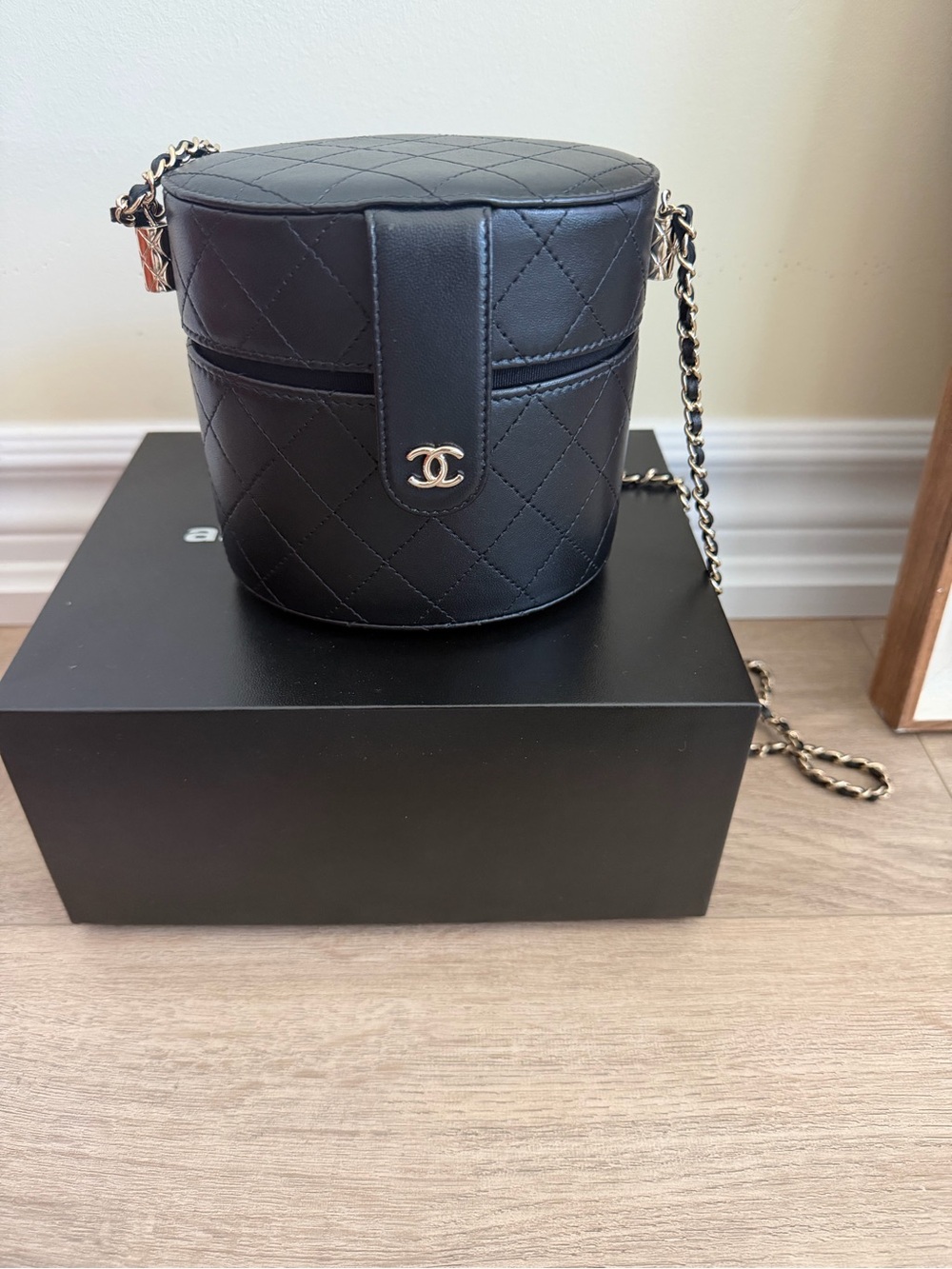 CHANEL Black Quilted Round Vanity Crossbody with Gold Chain